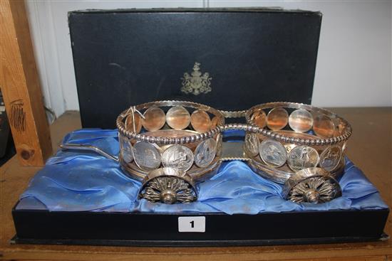 A cased 1970s commemorative silver double decanter coaster carriage, 16.25in.